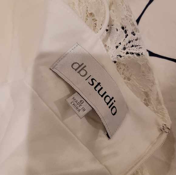 DB Studio Cap Sleeve Short Lace Sheath Wedding Dress from David's Bridal - Picture 7 of 11